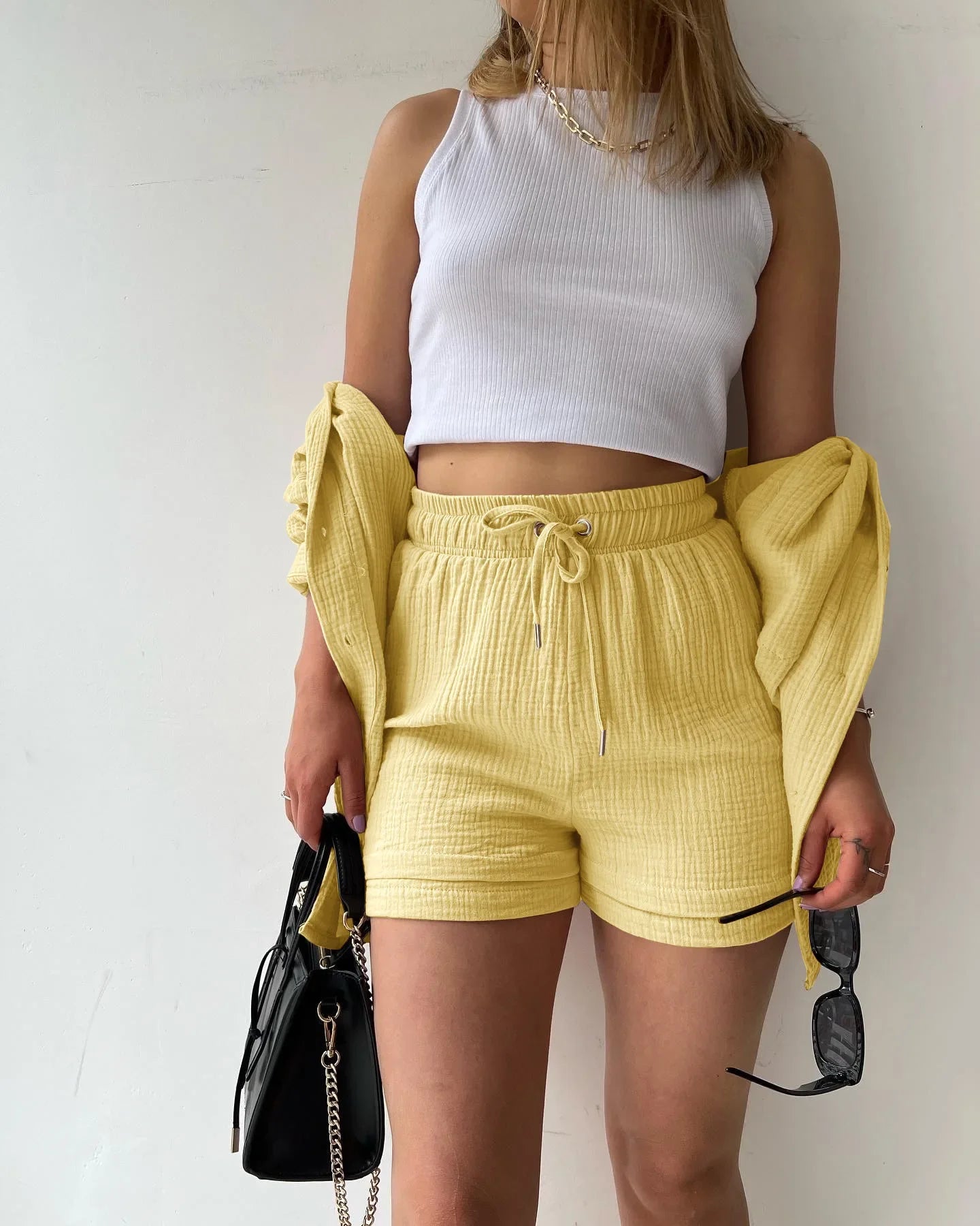 Ensemble deux pièces décontracté à manches longues et short pour femme en coton, tenue tendance à boutons, couleur unie et plissée, collection été